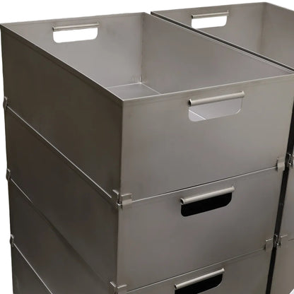 Stack of stainless steel euro crates with integrated carrying handholds