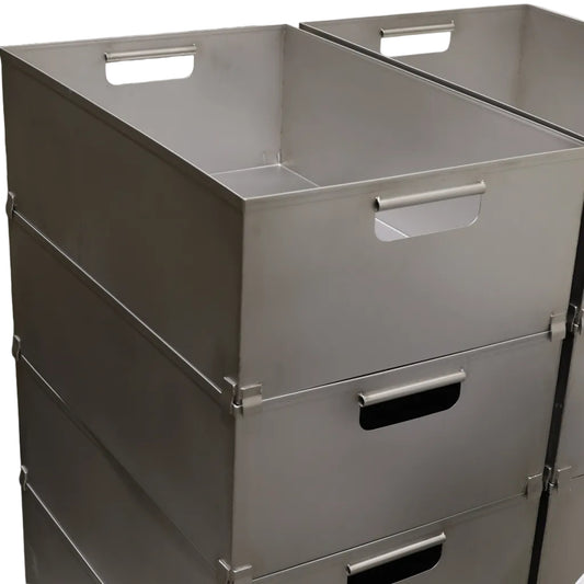 Stack of stainless steel euro crates with integrated carrying handholds