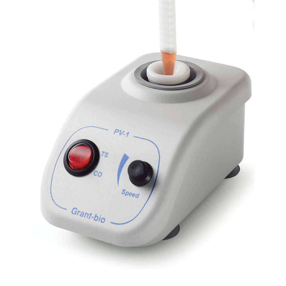 White vortex mixer with a sample tube on top