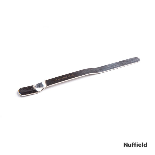 Singular stainless steel laboratory spatula with 'nuffield' in the corner